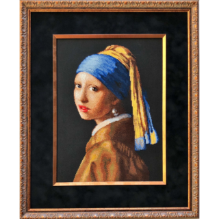 Cross-stitch embroidery of Vermeer’s Girl with a Pearl Earring, featuring a young woman wearing a blue and yellow headscarf and pearl earring. Set against a dark black background in an ornate silver frame. Design from RIOLIS kit 100/063.