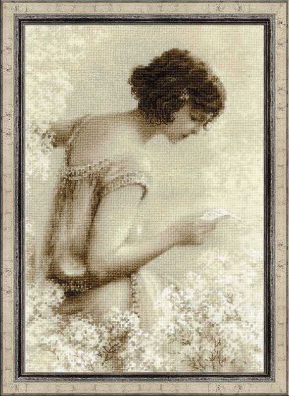 Cross-stitch embroidery in sepia tones featuring a young woman reading a letter, surrounded by soft white flowers. The design has a vintage, old-photo effect. Kit from RIOLIS 1227 Old Photo. The Letter.