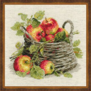 Cross-stitched image of a woven basket filled with ripe red and yellow apples, surrounded by green leaves and fallen apples.