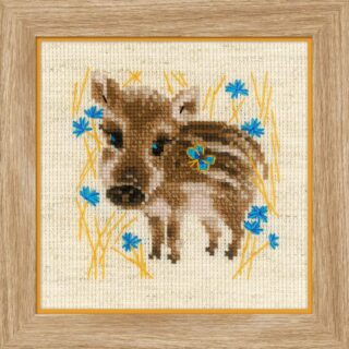 Cross-stitch image of a baby wild boar standing in golden grass with bright blue flowers.