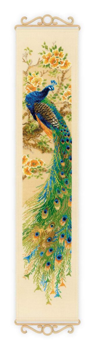 A tall cross stitch panel of a vivid peacock perched on a flowering tree branch, with long, colorful tail feathers cascading downward.