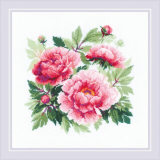 A detailed cross stitch design of full pink tree peony blossoms surrounded by green leaves and unopened buds.