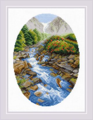 A peaceful cross-stitch landscape featuring a clear mountain stream flowing over rocks with pine trees, flowering bushes, and snowy peaks in the distance.