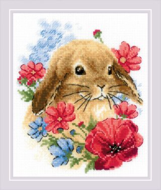 A sweet brown bunny surrounded by red, pink, and blue flowers in a cheerful cross-stitch design.