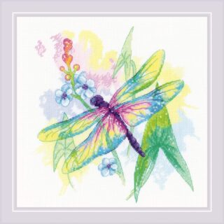 A colorful dragonfly cross-stitch with rainbow wings surrounded by delicate flowers and green leaves, set against a soft watercolor-style background.