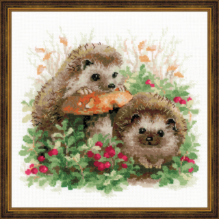 Cross stitch of two cute hedgehogs surrounded by green leaves and red lingonberries, with one hedgehog resting on a large orange mushroom.