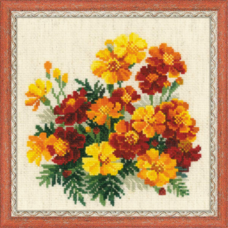 A cross-stitch artwork of bright marigolds in shades of yellow, orange, and red, arranged as a cheerful bouquet on cream fabric.