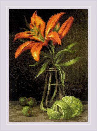 A vivid orange lily in a glass vase with fresh green limes on a dark background.