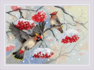 A cross-stitch design of two waxwing birds perched on snowy branches with clusters of red berries against a soft winter background.