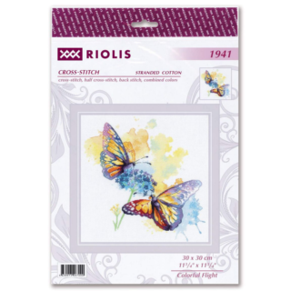 Two vibrant butterflies rest on blue wildflowers against a splashy watercolor-style background in this colorful cross-stitch design.