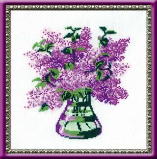 A cross-stitch design of a glass vase filled with blooming purple lilacs and green leaves on a white background.