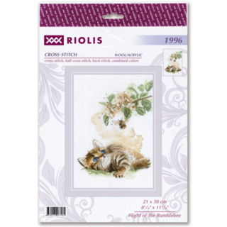 A cross-stitch of a kitten lying in grass and gazing at a flying bumblebee near a blooming branch with soft yellow and green tones.