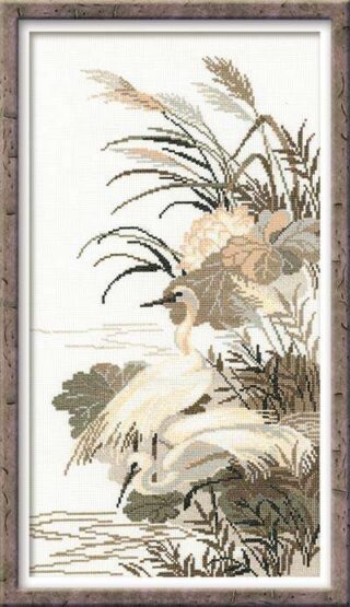 Cross-stitch design of elegant herons standing among tall grasses by a calm riverside in soft, muted tones.