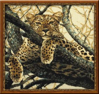 Cross-stitch design of a relaxed leopard lying on a tree branch with a calm, watchful gaze.