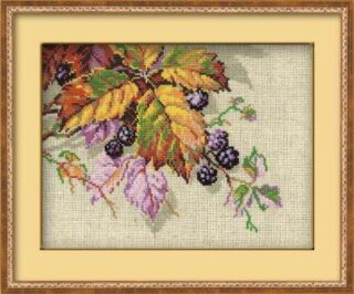 A cross-stitch design of ripe blackberries on a vine surrounded by autumn-colored leaves in shades of gold, orange, and purple.
