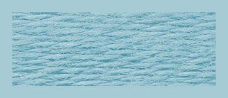 Close-up of RIOLIS wool/acrylic embroidery thread, showing its soft texture and even fibers for smooth stitching.