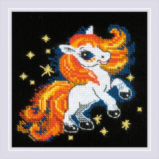 Cross-stitch of a white foal with a fiery red and orange mane prancing among stars on a black background.