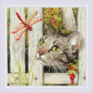 Cross-stitch of a curious tabby cat peeking through a wooden fence at a red dragonfly, with green leaves and berries in the background.