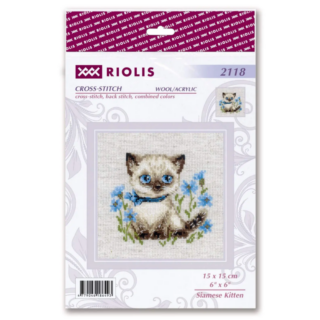 A cross-stitch design of a Siamese kitten with striking blue eyes, wearing a blue ribbon, surrounded by delicate blue flowers.