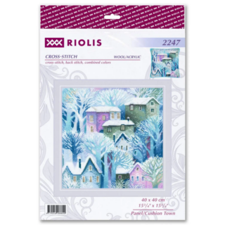 A winter village scene with colorful houses surrounded by snow-covered trees in soft pastel tones.