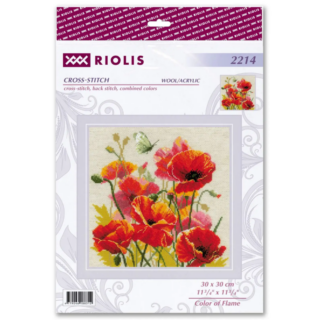 A cross-stitch design of bright red and orange poppies with a soft green butterfly fluttering above, set against a neutral background.