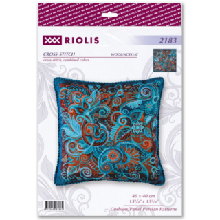 Intricate cross-stitched cushion cover with Persian-inspired floral and swirl patterns in rich blue, turquoise, and rust tones.