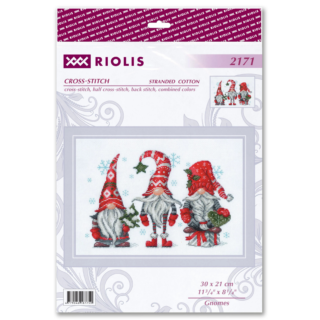 Three festive Christmas gnomes in red hats holding holiday decorations with snowflakes falling around them.