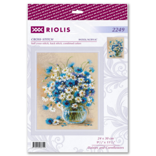 A cross-stitch design of a glass vase filled with white daisies and bright blue cornflowers set against a soft beige background.