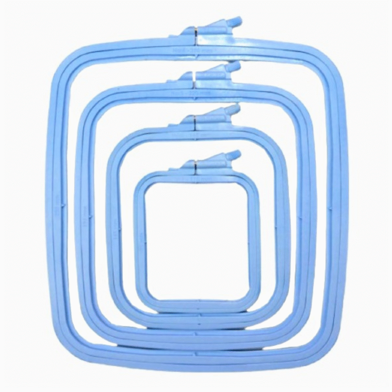 Square pastel blue plastic embroidery hoops in four sizes, designed to hold and display finished cross stitch and embroidery projects.