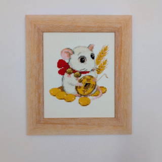 Framed cross-stitch artwork of a white mouse holding a coin and a wheat stalk, sitting among golden coins on a light background.