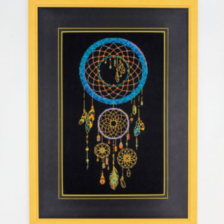 Stitched and framed embroidery artwork depicting a colorful dreamcatcher with feathers, beads, and geometric patterns on a black background.