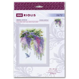 Cross-stitched cascading wisteria flowers in purple, pink, and lavender shades with green leaves and a butterfly below, stitched on white fabric.