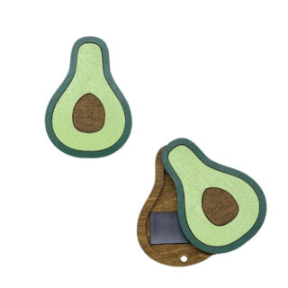 Colorful wooden needle cases shaped like avocado.