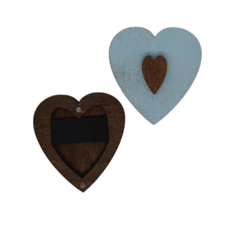 Heart-shaped wooden needle case in soft pastel blue, with a contrasting heart inlay and magnetic interior.