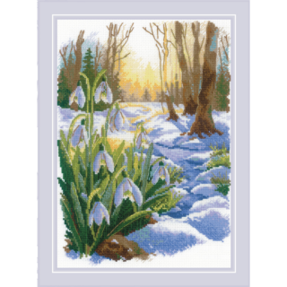 Cross-stitched snowdrops emerging through melting snow in a forest at sunrise, with warm golden light in the background.